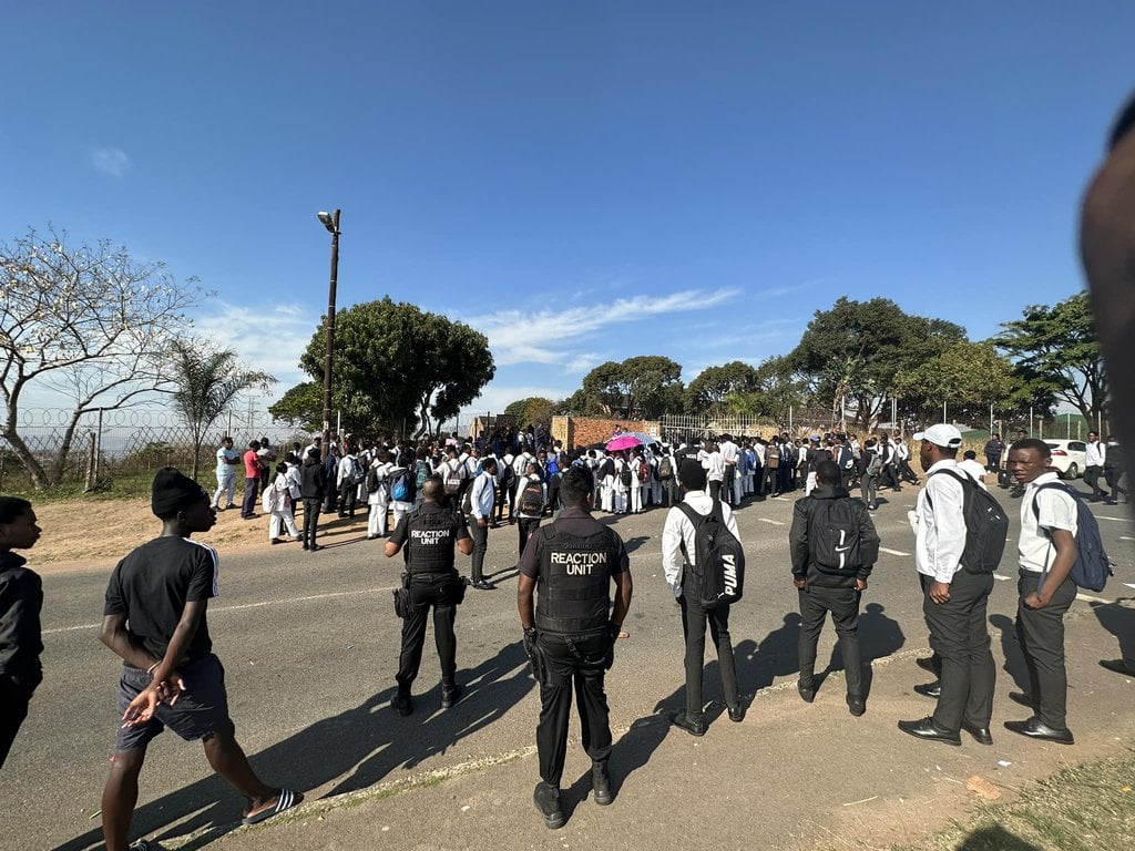 Scholars protest over arrests after murder