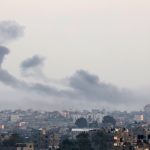 Smoke rises following Israeli strikes in Khan Yunis in the southern Gaza Strip, early on December 4, 2023, amid ongoing fighting between Israel and the Palestinian group Hamas. (Photo by SAID KHATIB / AFP)