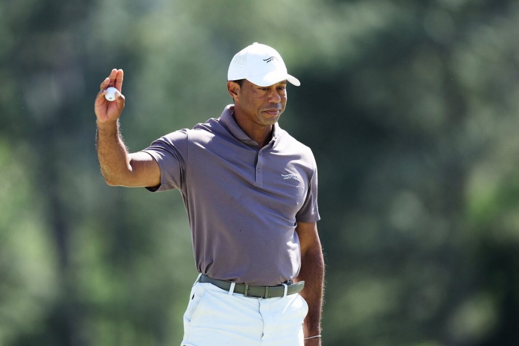 Masters golf: Scottie leads, but Tiger shatters record