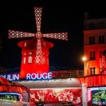 Blades of iconic Moulin Rouge collapse
